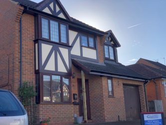 Replacement mock Tudor boards and panels transforming a detached home exterior