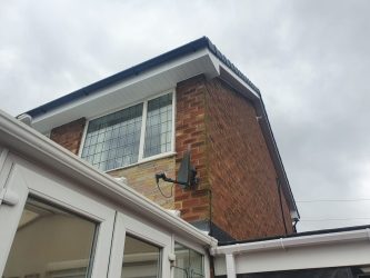 Replacement white uPVC fascias and soffits with neat roof edge detailing